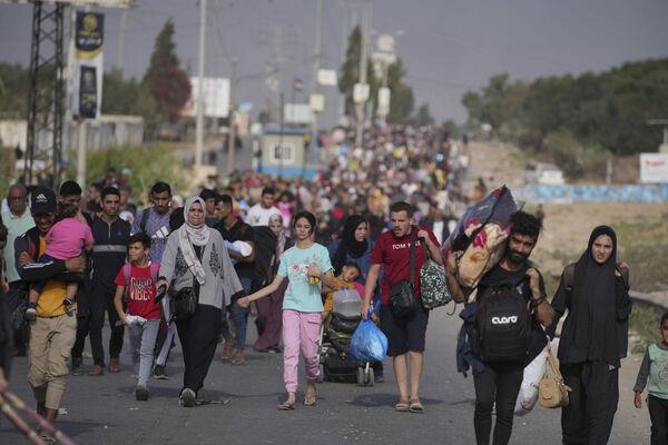 Palestinians flee to the southern Gaza Strip on Salah al-Din Street in Bureij, Gaza Strip, on Wednesday, November 8, 2023. Picture: AP Photo/Hatem Moussa Palestinians flee to the southern Gaza Strip on Salah al-Din Street in Bureij, Gaza Strip, on Wednesday, November 8, 2023. Picture: AP Photo/Hatem Moussa